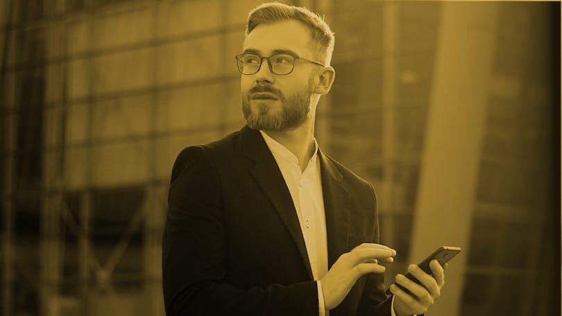 business man confident results golden 810x456